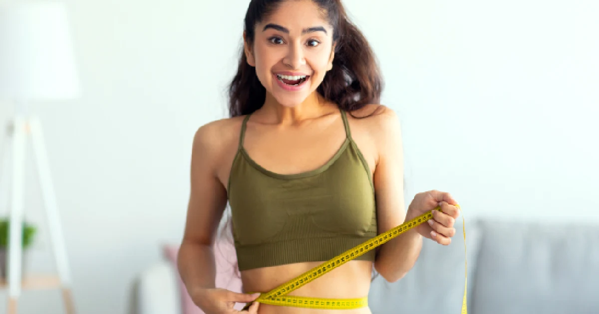 Smiling woman representing success in Semaglutide Treatmnet in Woodlands, TX