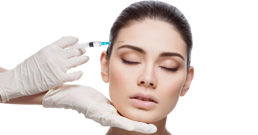 Women Receiving Wrinkle Relaxers injection on forehead for smooth skin in Woodlands, TX