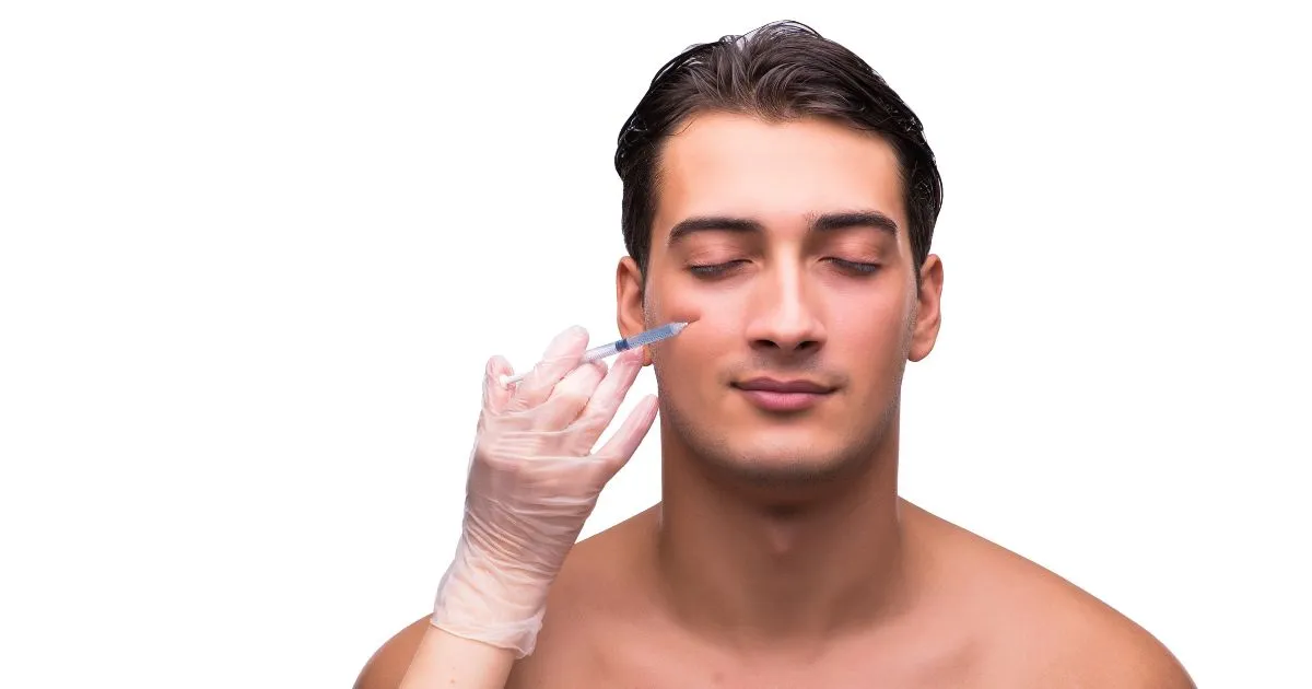 Cosmetic procedure with biostimulators being injected into a man's face in Woodlands, TX
